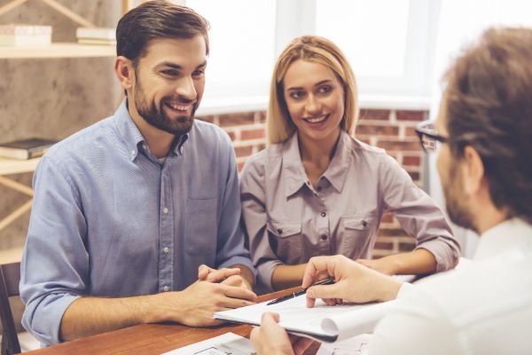 Image of young entrepreneurs getting business consultation